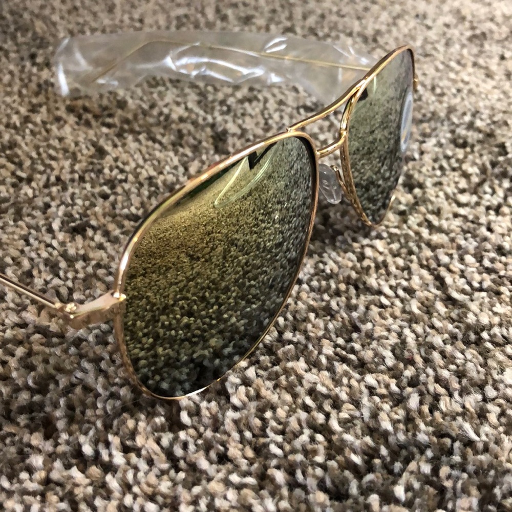 Gold rimmed, mirrored aviators